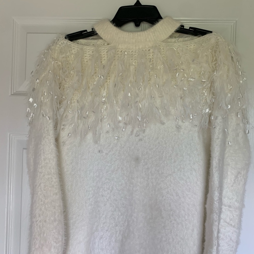 White cold shoulder sweater.